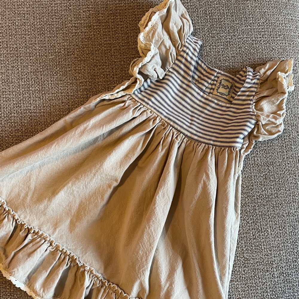 Little prim dress sold